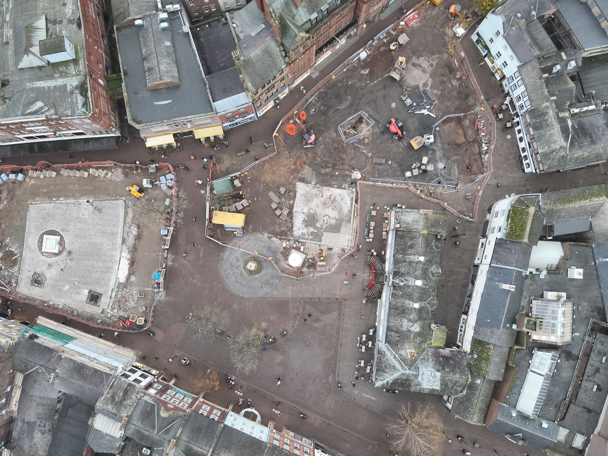 Aerial view of first stages of paving and engineering work at Carlisle Greenmarket and war memorial